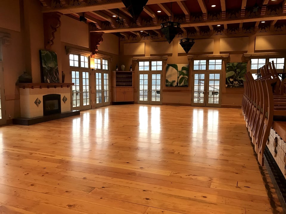 Gymnasium hardwood floor refinished with fresh court lines