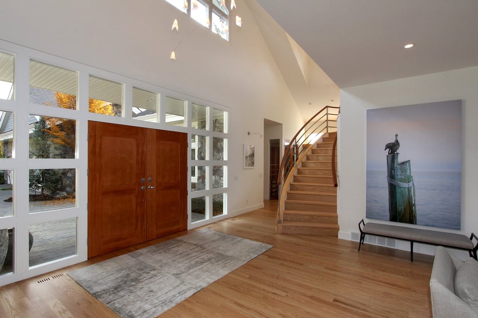 Stairs finished in the same hardwood as the adjoining floor