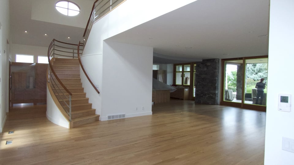 Custom-built hardwood stairs with matching handrail